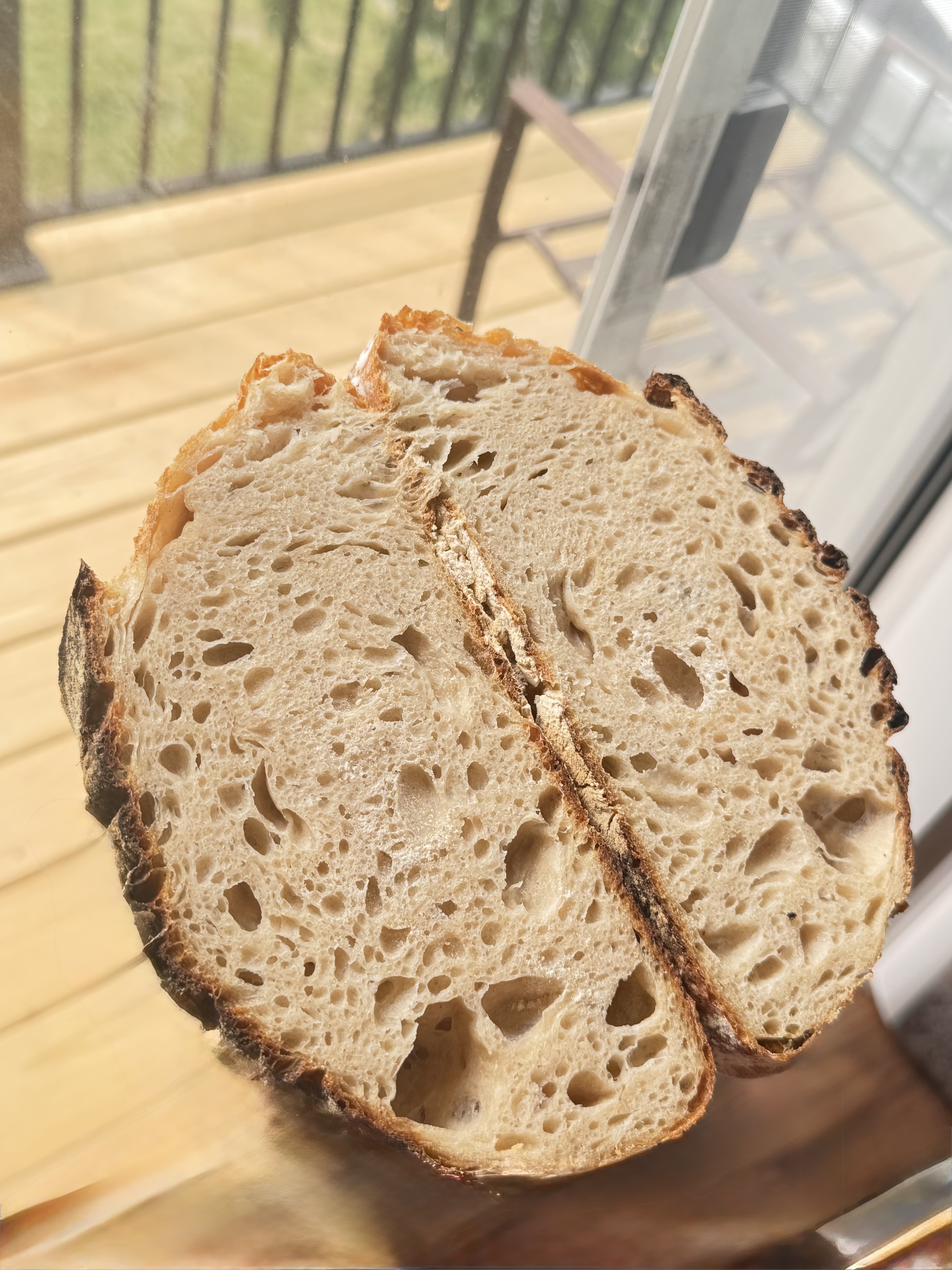 Warm handcrafted sourdough loaves fresh from the oven